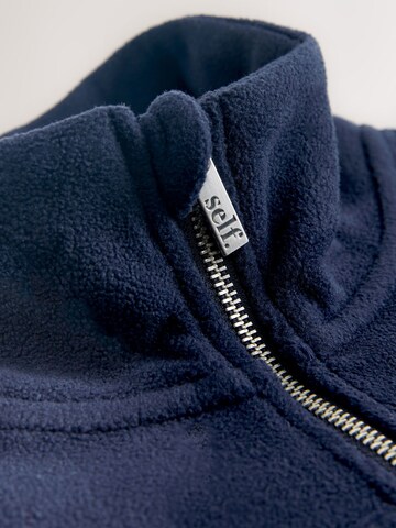 self. Pullover in Blau