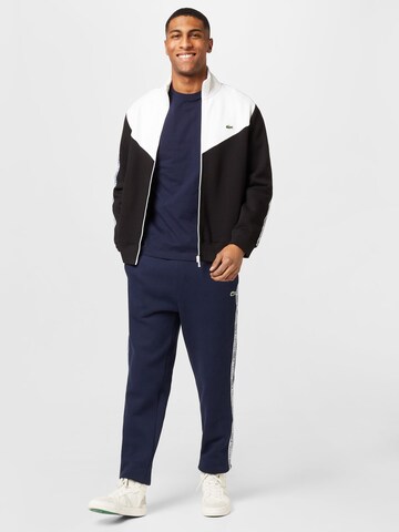 Tapered Pantaloni de la LACOSTE pe albastru