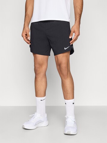 NIKE Loosefit Παντελόνι φόρμας σε μαύρο: μπροστά