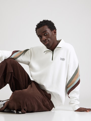 Kaotiko Sweatshirt 'WALKER SOCIETY' in Beige: voorkant