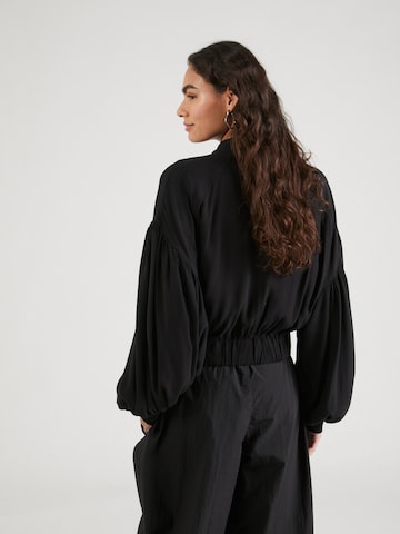 Veste mi-saison Free People en noir