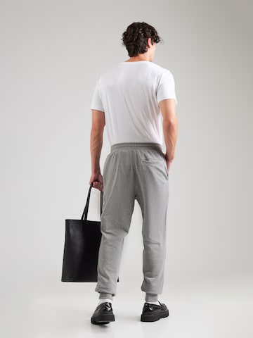 TOMMY HILFIGER Tapered Παντελόνι 'ESSENTIAL' σε γκρι