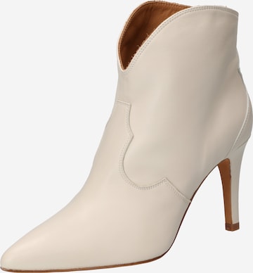 Toral Ankle Boots in White: front