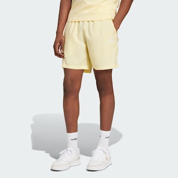 ADIDAS SPORTSWEAR Regular Workout Pants 'Essentials Chelsea' in Yellow