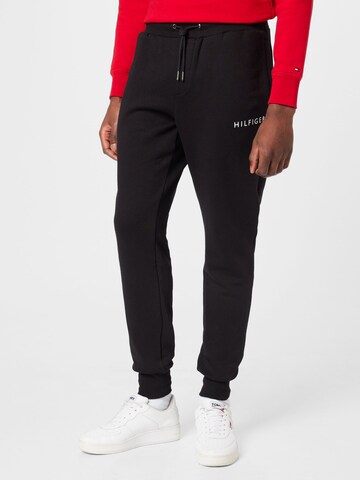 TOMMY HILFIGER Tapered Pants in Black: front