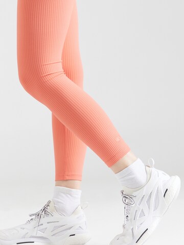 DKNY Performance Skinny Workout Pants in Orange