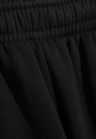 Largi Pantaloni de la WEEKDAY pe negru