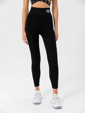 Skinny Pantalon de sport 'Naikan' MOROTAI en noir : devant