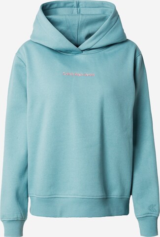 Sweat-shirt Calvin Klein Jeans en bleu : devant