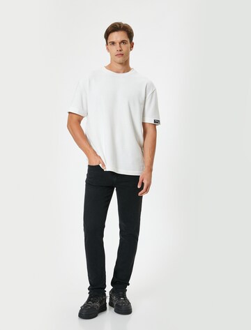 Koton Flared Jeans 'Brad' in Zwart