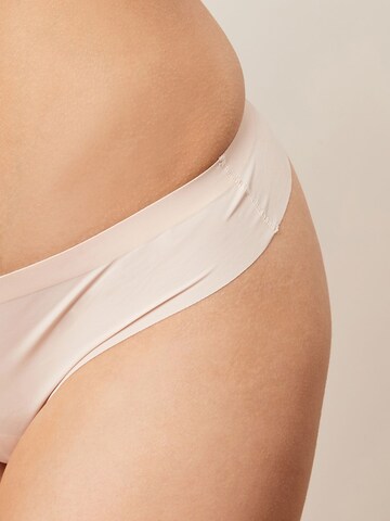 Next String i beige