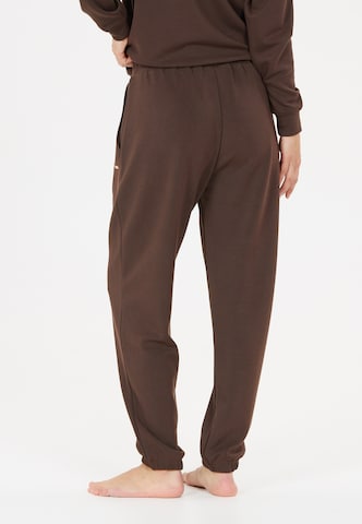Athlecia Tapered Sportbroek 'Jillnana V2' in Bruin