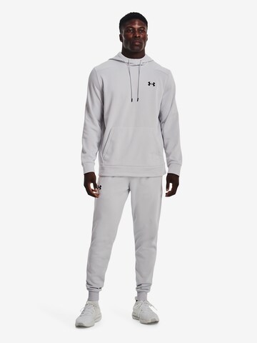 Sweat de sport UNDER ARMOUR en gris