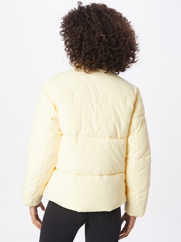 Champion Authentic Athletic Apparel Winter jacket in Yellow