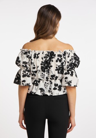 Camicia da donna di faina in bianco