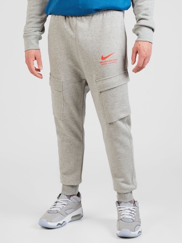 Nike Sportswear Tapered Cargo Pants in Grey: front