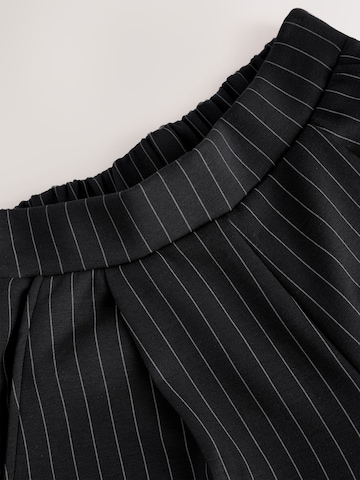 Wide leg Pantaloni di Next in nero