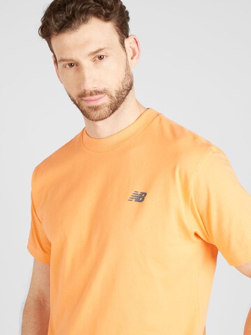 new balance - Camiseta en naranja