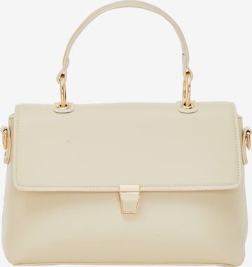 Usha Handbag in White: front