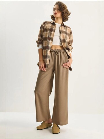 Wide Leg Pantalon Bianco Lucci en beige