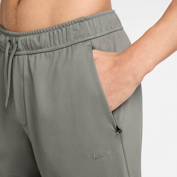 NIKE Tapered Workout Pants in Green