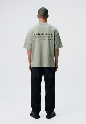 Maglietta 'PRODUCT OF BERLIN' di Vertere Berlin in verde: dietro