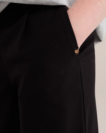 WE Fashion Regular Trousers 'Meisjes' in Black