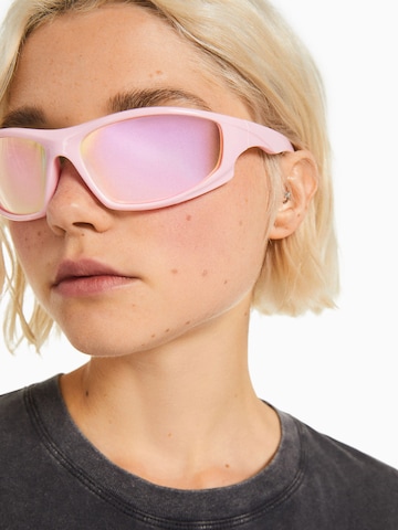 Lunettes de soleil Bershka en rose