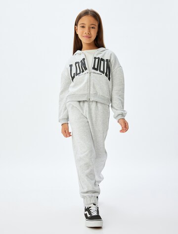Koton Tapered Trousers in Grey: front