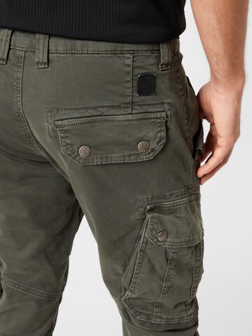 Tapered Pantaloni cargo 'Combat' di ALPHA INDUSTRIES in grigio