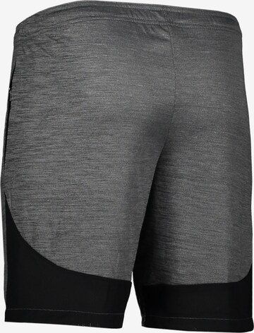 Regular Pantalon de sport NIKE en gris