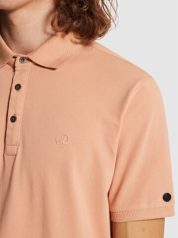 CAST IRON Paita 'Polo shirt in piqué with stretch' värissä oranssi