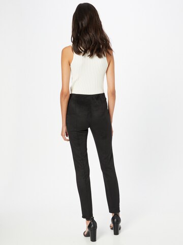 GUESS Skinny Leggings in Schwarz