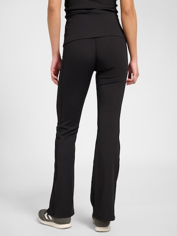 évasé Pantalon de sport Hummel en noir