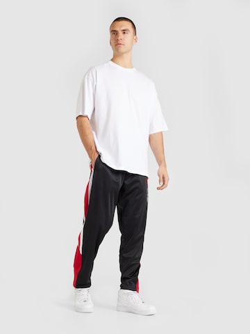 Regular Pantalon de sport 'Chicago Bulls' Mitchell & Ness en noir