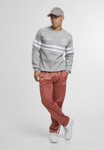 Unfair Athletics Sweatshirt 'DMWU' in Grijs