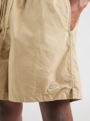 Nike Sportswear regular Παντελόνι 'CLUB FLOW' σε μπεζ