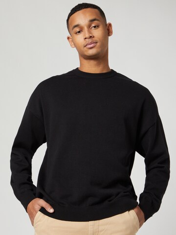 Kosta Williams x About You Sweatshirt in Zwart: voorkant