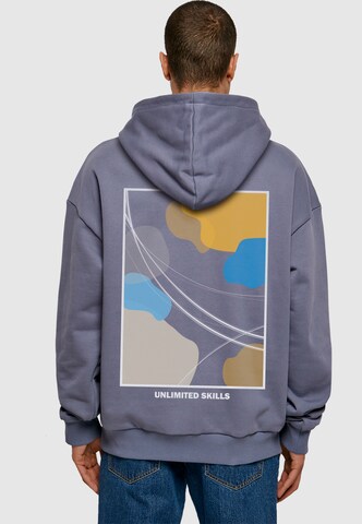 Merchcode Sweatshirt 'Unlimited Skills' in Blauw: voorkant