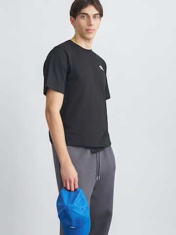 THE NORTH FACE Μπλουζάκι σε μαύρο