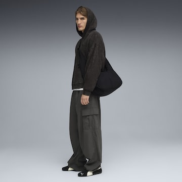 PUMA Sweatshirt 'Future Archive' in Schwarz