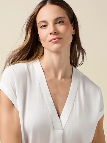 Camicia da donna di oltre in bianco