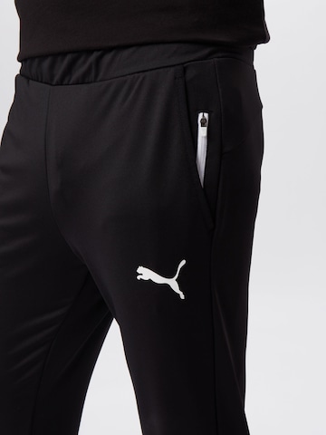 Tapered Pantaloni sport de la PUMA pe negru