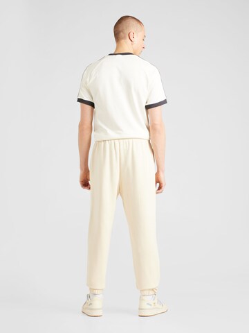 Champion Authentic Athletic Apparel Tapered Broek in Beige