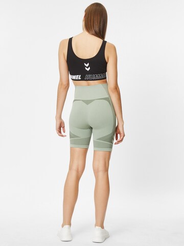 Hummel Skinny Športne hlače 'Unite' | zelena barva
