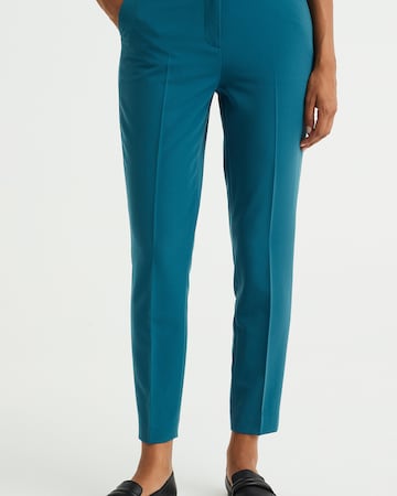 Coupe slim Pantalon à plis WE Fashion en vert