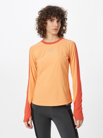 NIKE - Camisa funcionais 'Air' em laranja: frente