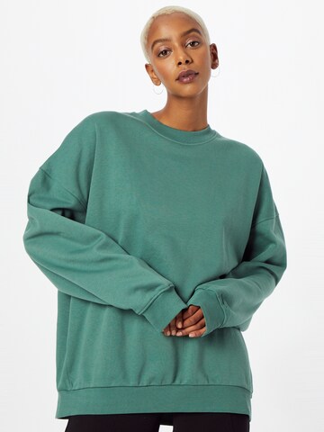 WEEKDAYSweater majica - zelena boja: prednji dio