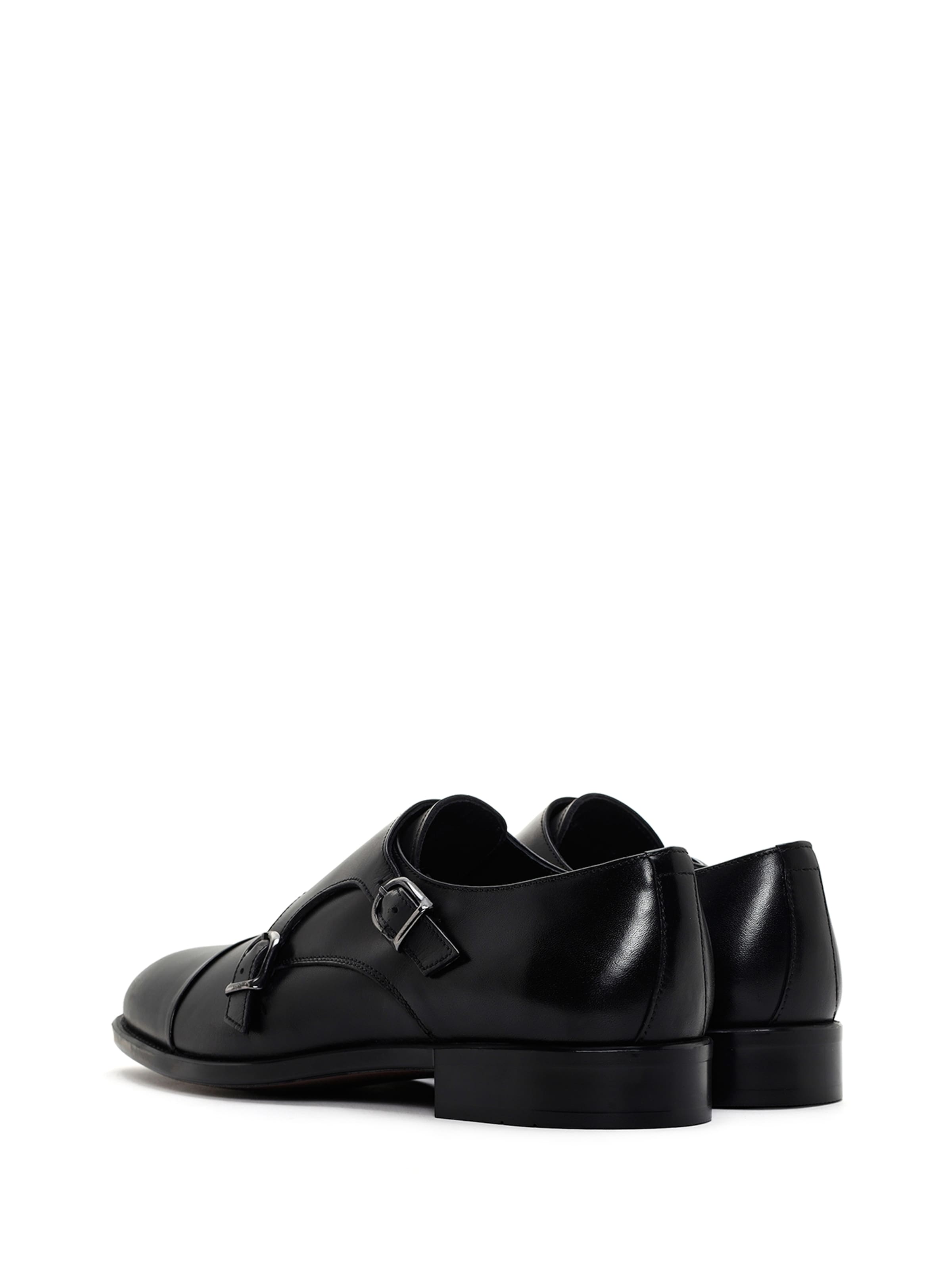 Slipper di Derimod in nero