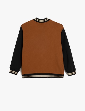 Koton Tussenjas in Bruin